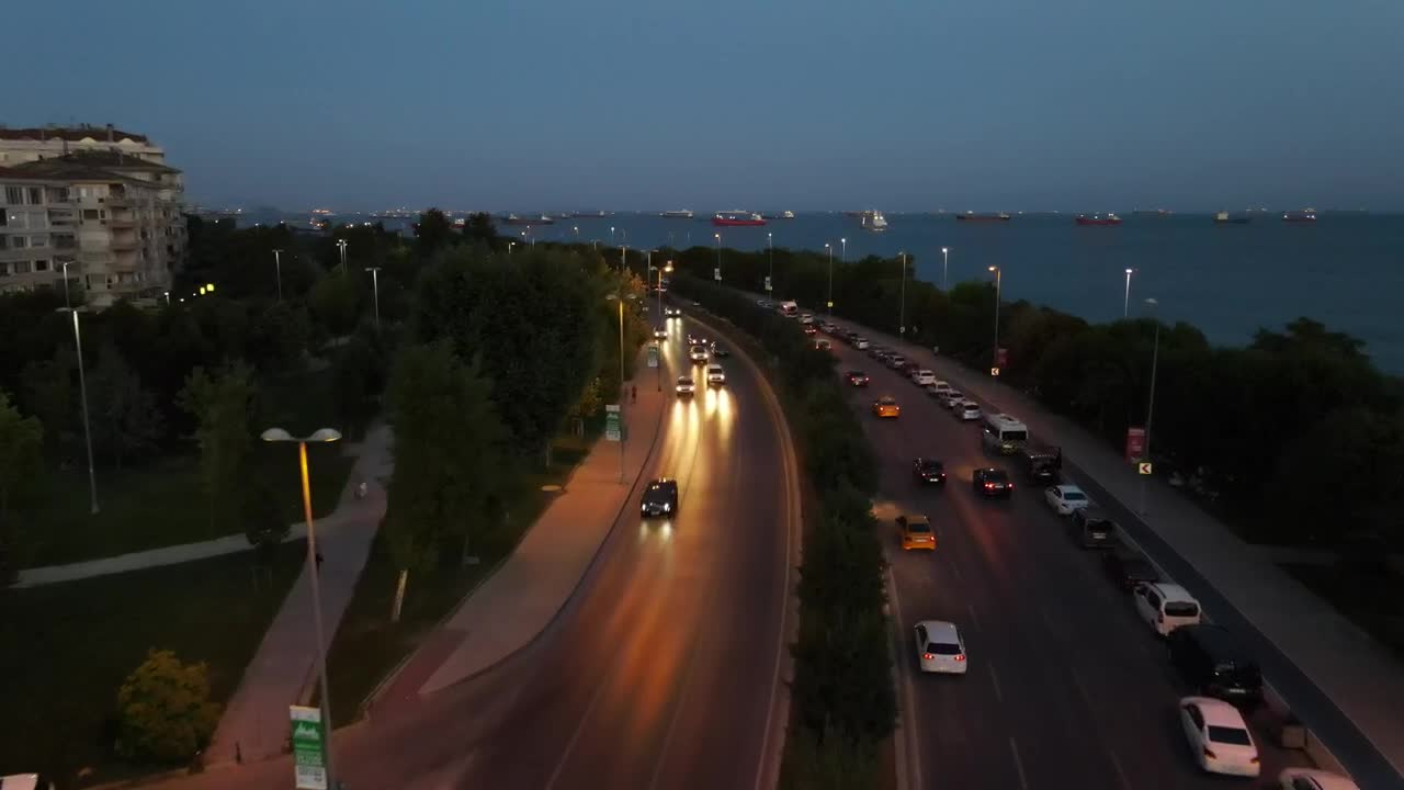 Video Stock City Traffic During The Dusk Near The Seashore Live Wallpaper For PC - Free Download