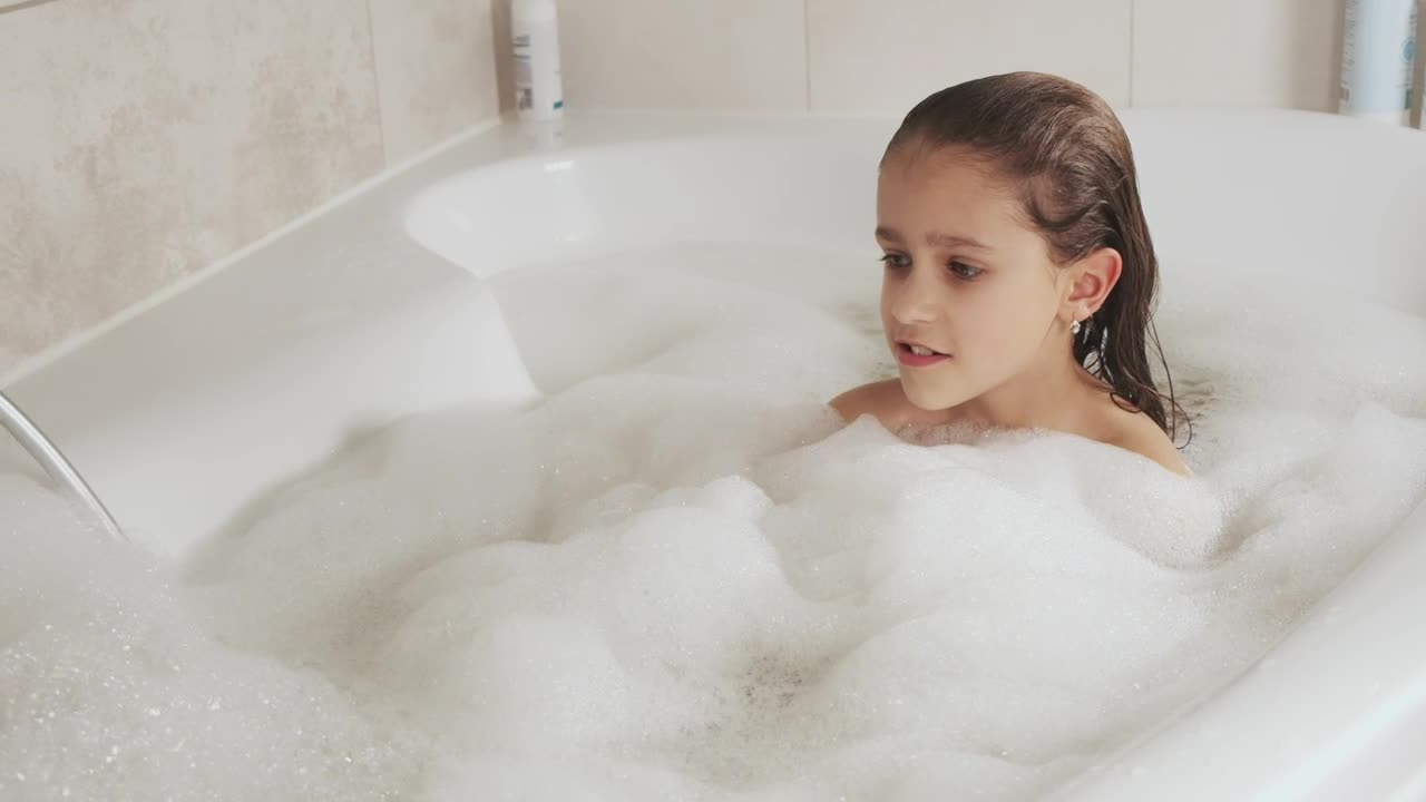 Stock Video Little Girl Plays With The Foam From Her Tub Animated Wallpaper - Free Download