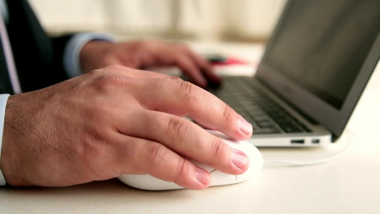 Video Stock Businessman In Suit Working On A Macbook Live Wallpaper For PC - Free Download