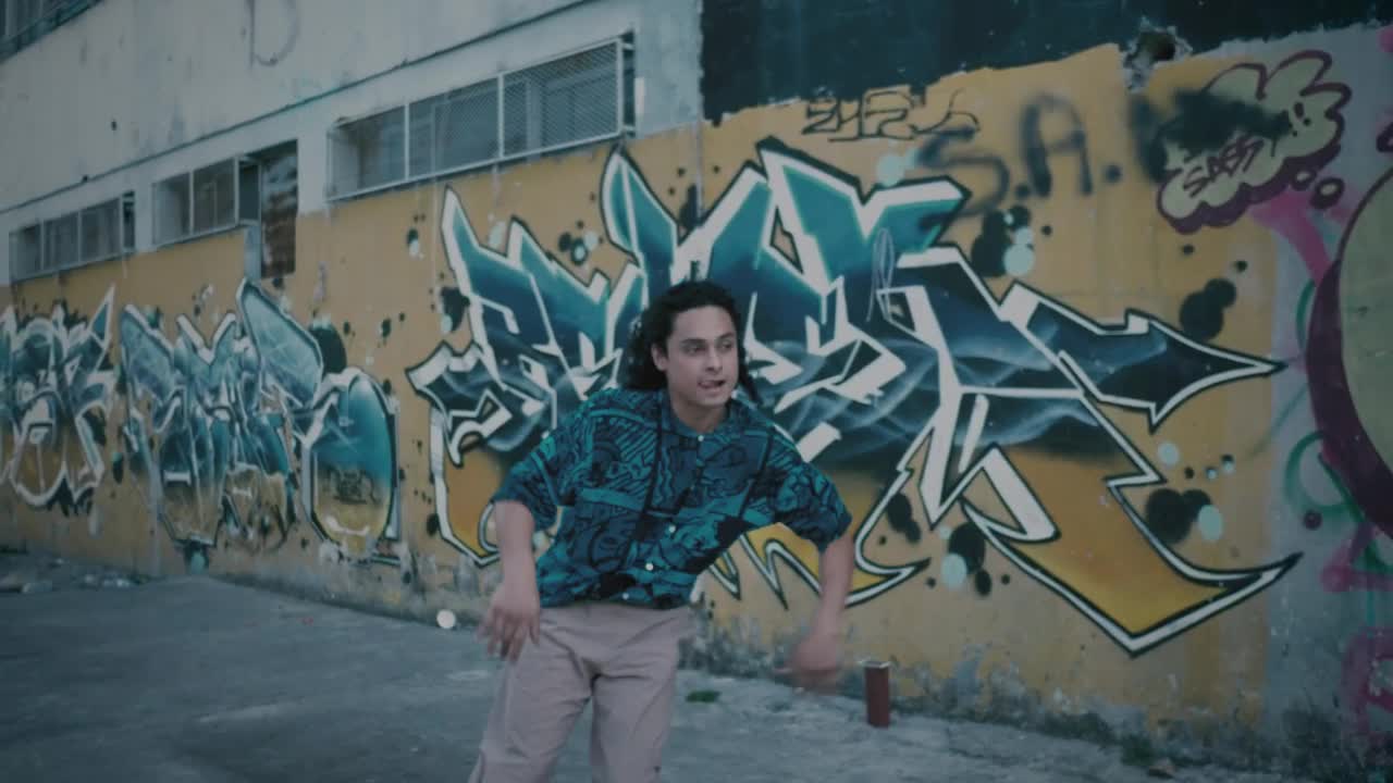 Stock Video Man Dancing On The Street Of A Neighborhood Animated Wallpaper - Free Download