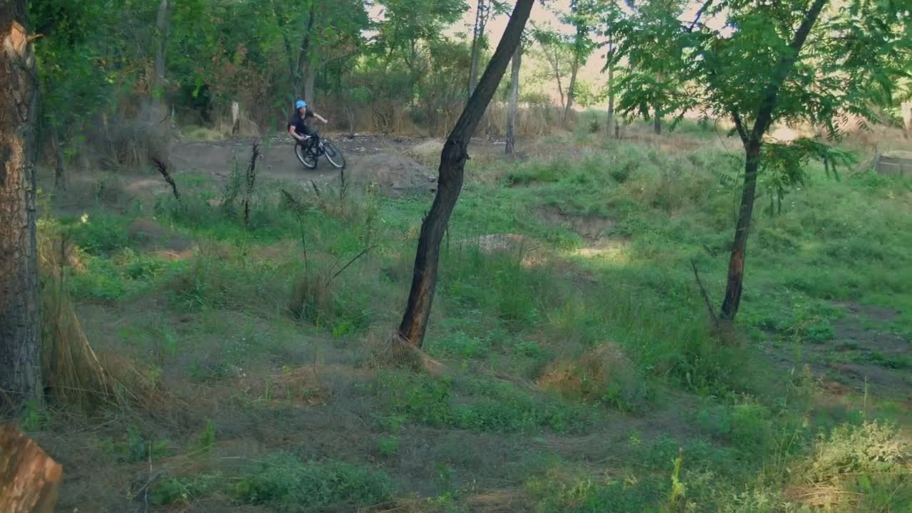 Stock Video Mountain Biker Speeding On The Dirt Path Live Wallpaper - Free Download