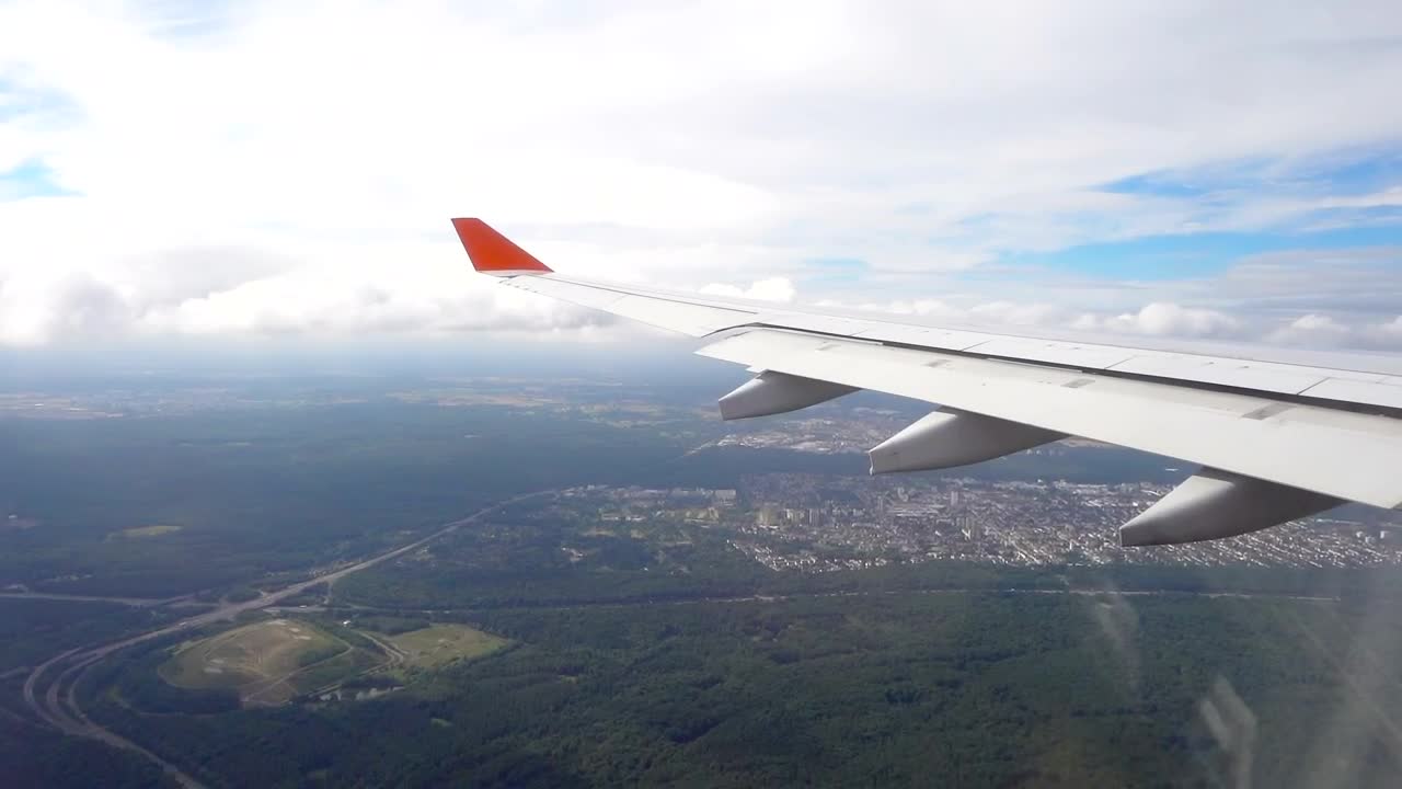 Stock Footage View From The Airplane Of A City In The Forest Live Wallpaper - Free Download