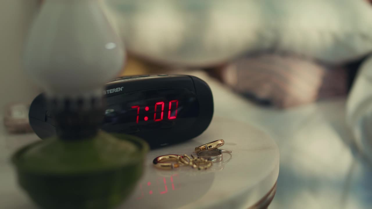 Free Stock Video Woman Turning Off Her Alarm Clock Live Wallpaper - Free Download