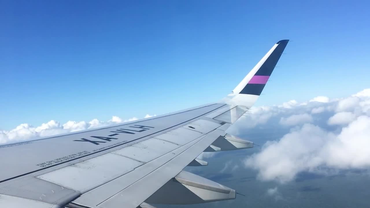 Stock Video Looking At The Sky From The Window Of An Airplane Animated Wallpaper - Free Download