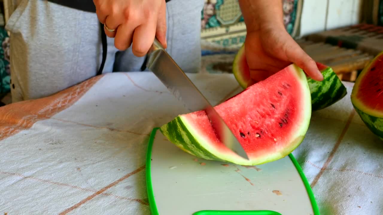 Stock Footage Watermelon Being Cut By Knife Live Wallpaper - Free Download