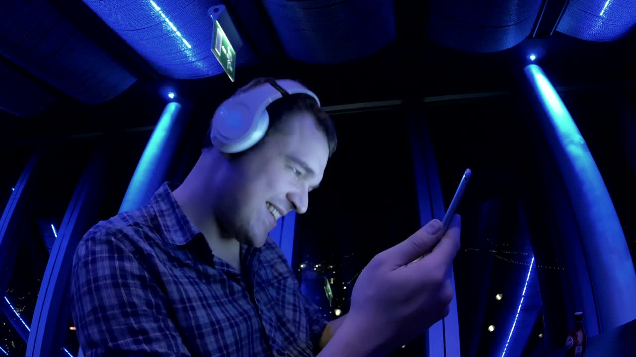 Stock Video Dancing To Music On His Phone Live Wallpaper For PC - Free Download