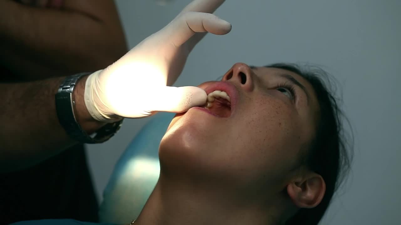 Stock Video Dentist Applying A Surgical Procedure Live Wallpaper For PC - Free Download