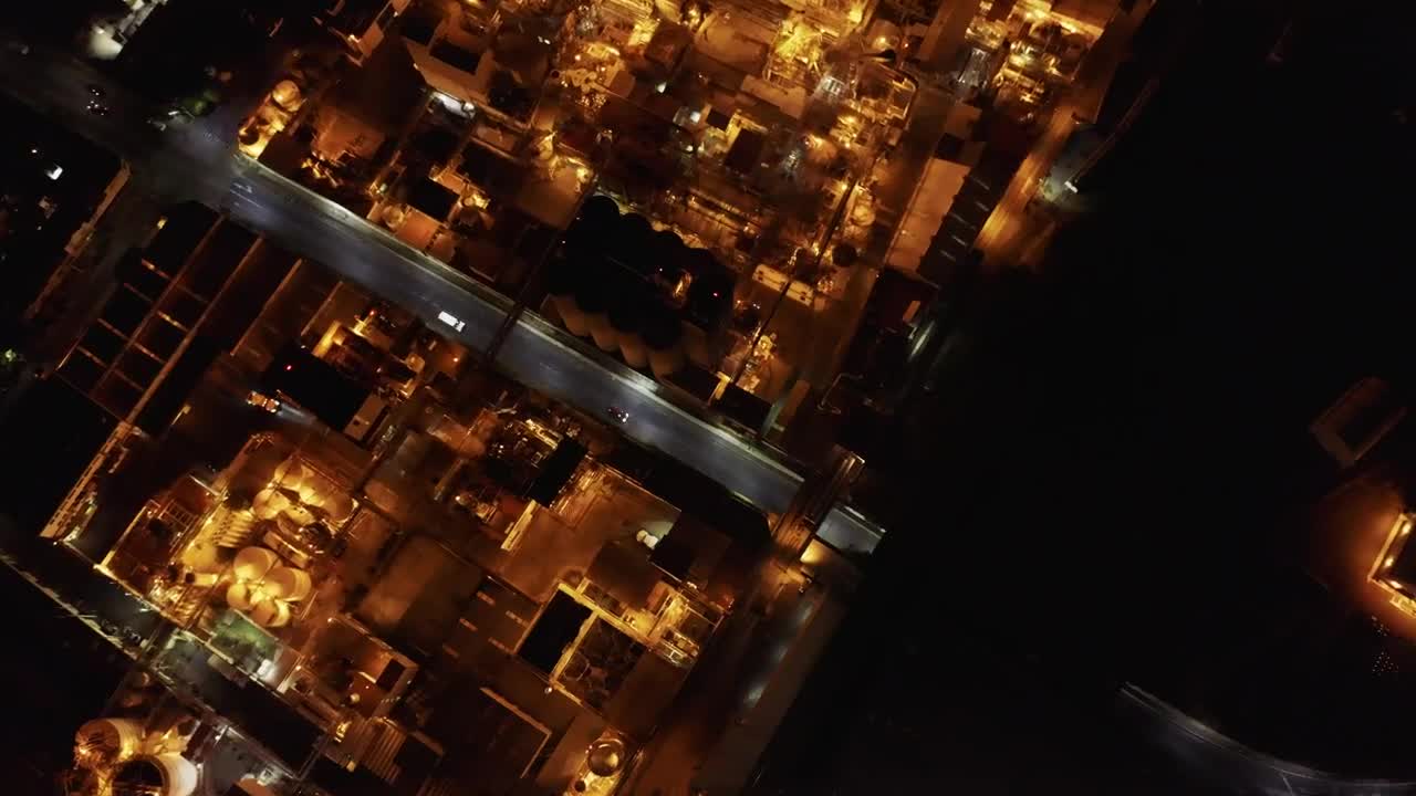Free Video Stock top aerial view of a factory during night time Live Wallpaper - Free Download