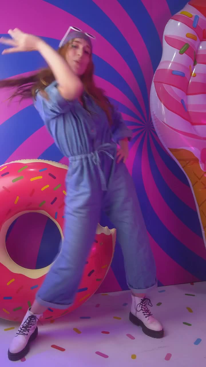 Stock Video Happy Woman Dancing Happily In A Colorful Spot Animated Wallpaper - Free Download
