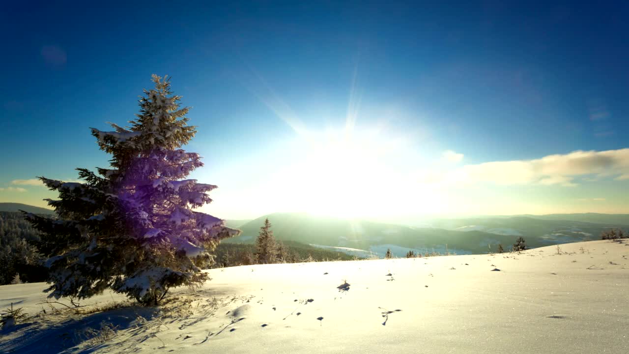 Free Video Stock sunset and dusk sunburst in the winter mountains Live Wallpaper - Free Download