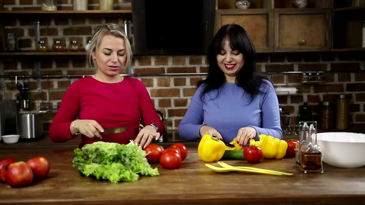 Stock Video Happy Women Cutting Vegetables At Home Animated Wallpaper - Free Download