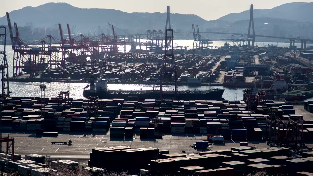 Stock Video Large Container Area On A Shoreline On A Sunny Day Animated Wallpaper - Free Download