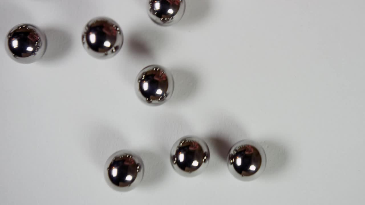 Stock Video Metal Pellets On White Surfac Animated Wallpaper - Free Download