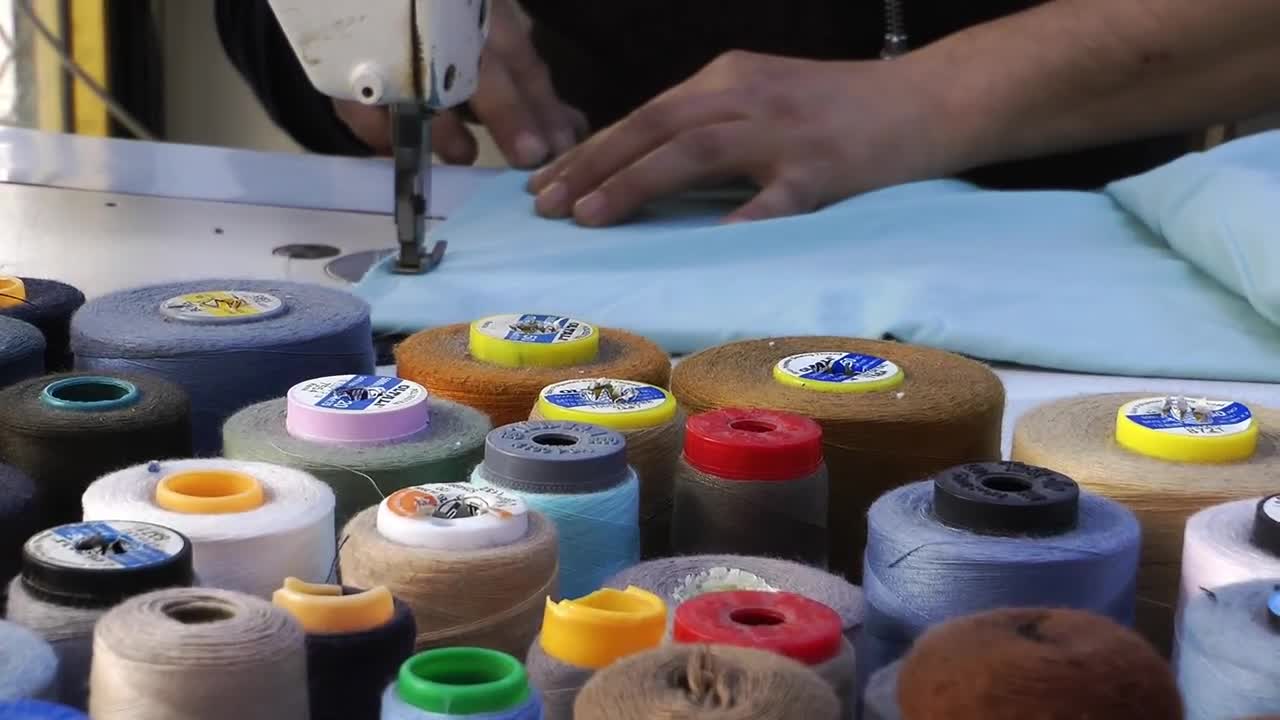 Stock Video Hands Of A Tailor Working Animated Wallpaper - Free Download