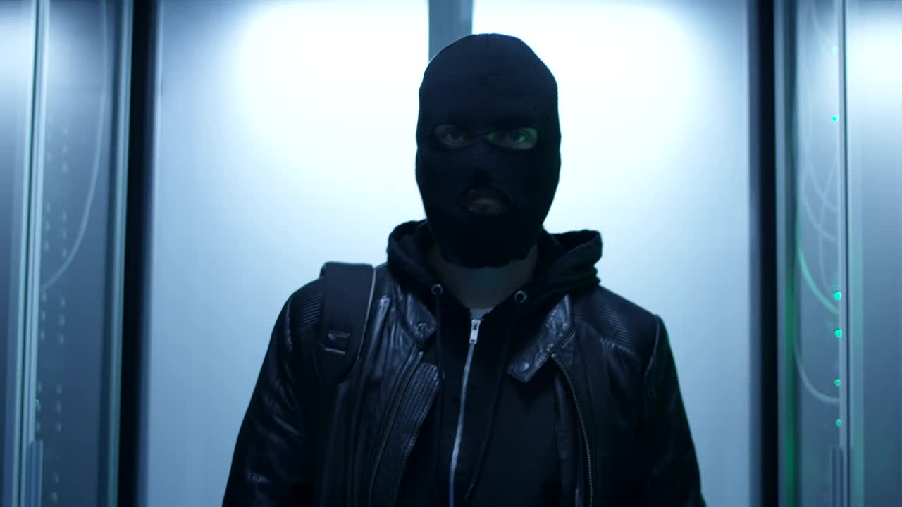 Stock Video Hacker With Face Mask Entering Data Center Live Wallpaper For PC - Free Download