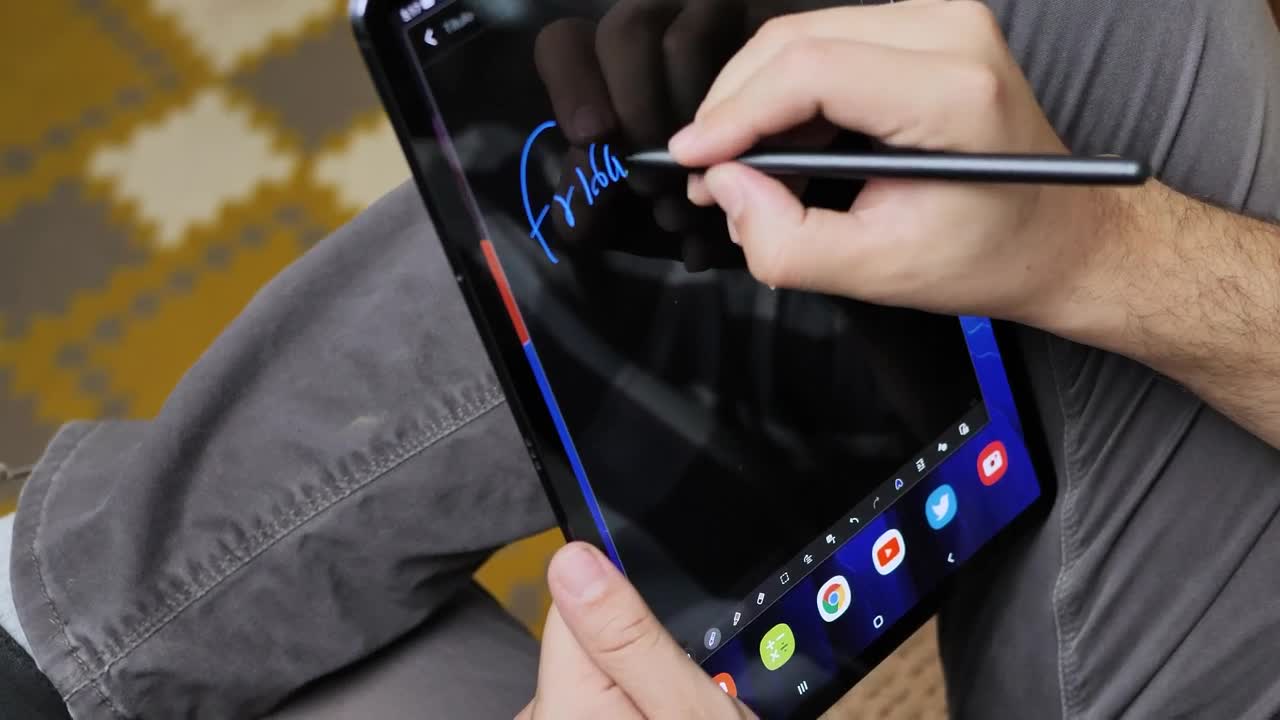 Stock Video Man Drawing On A Tablet And With A Touch Pen Animated Wallpaper - Free Download