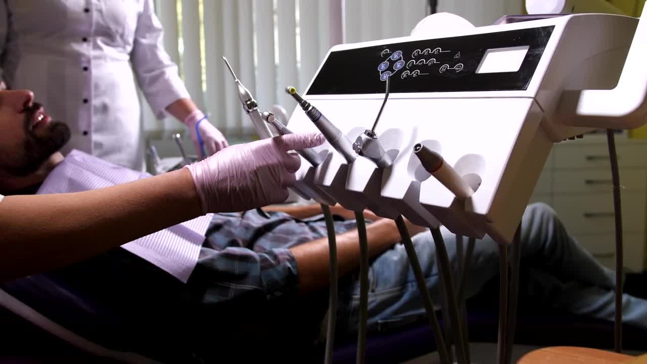 Stock Video Dentist Selecting A Drill Live Wallpaper For PC - Free Download