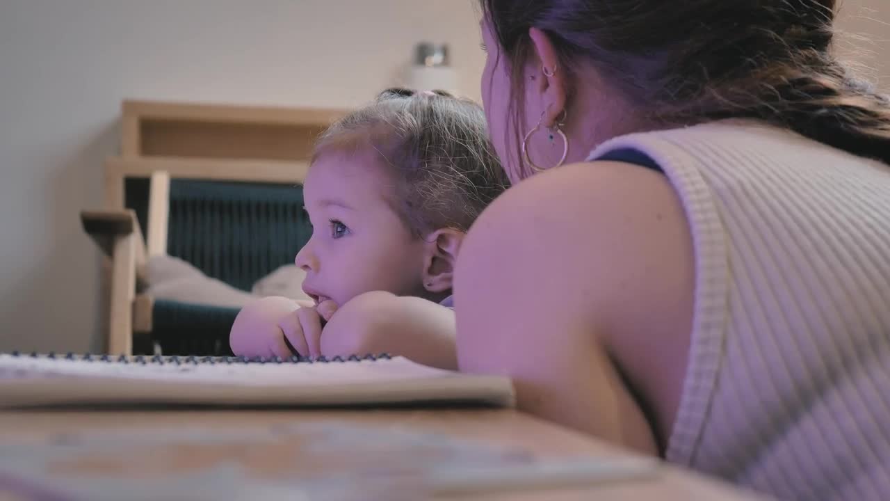 Stock Video Mother Talks To Her Daughter Who Watches T Animated Wallpaper - Free Download