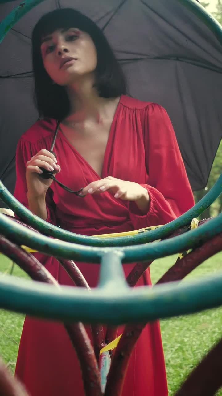 Stock Video Girl In Red And With Umbrella Through By An Old Live Wallpaper For PC - Free Download