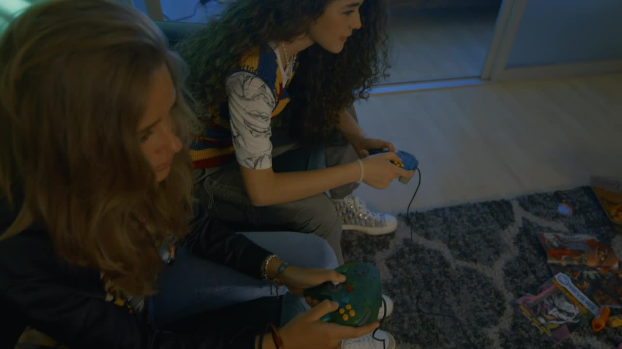 Free Video Stock three young friends gaming in the living room Live Wallpaper - Free Download