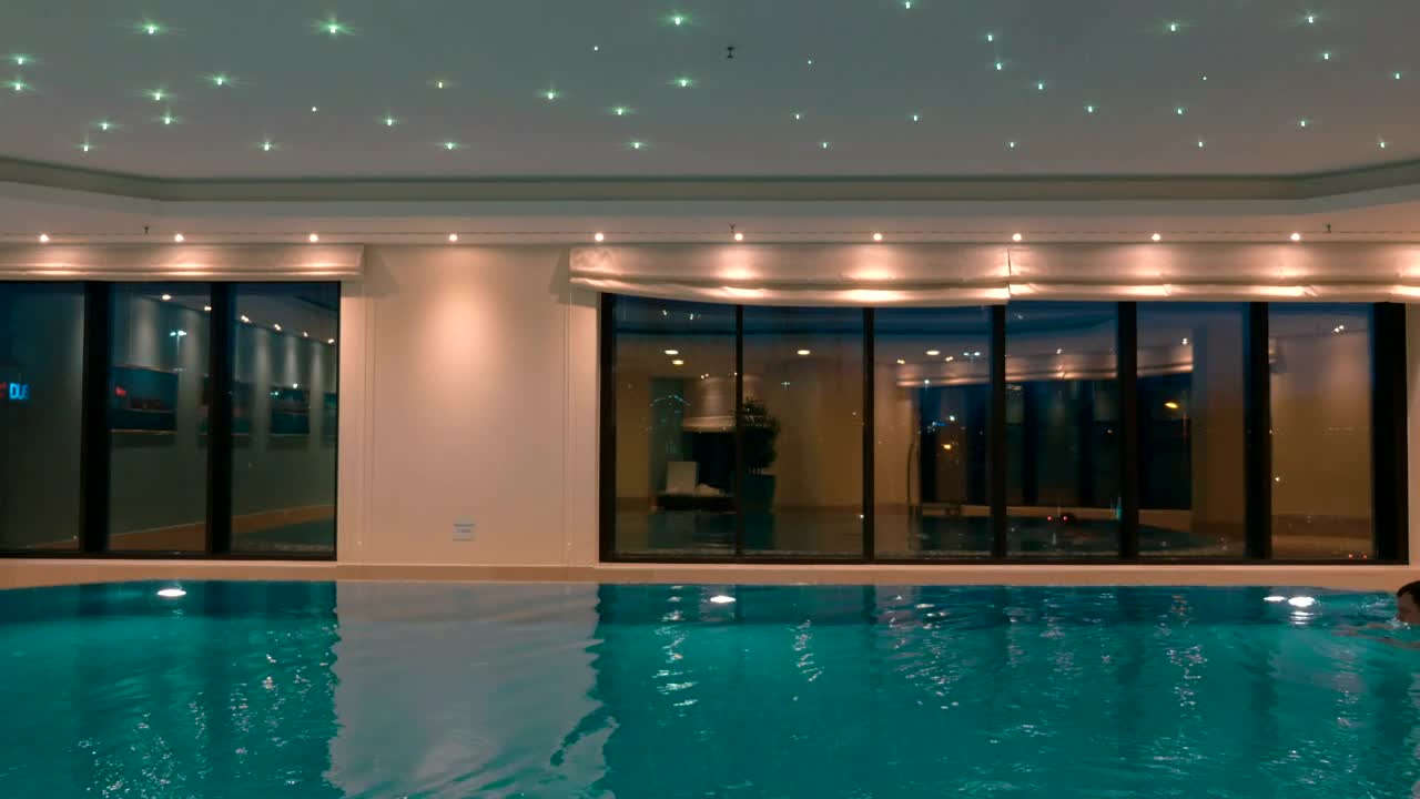 Free Video Stock swimming in a luxury hotel pool Live Wallpaper - Free Download