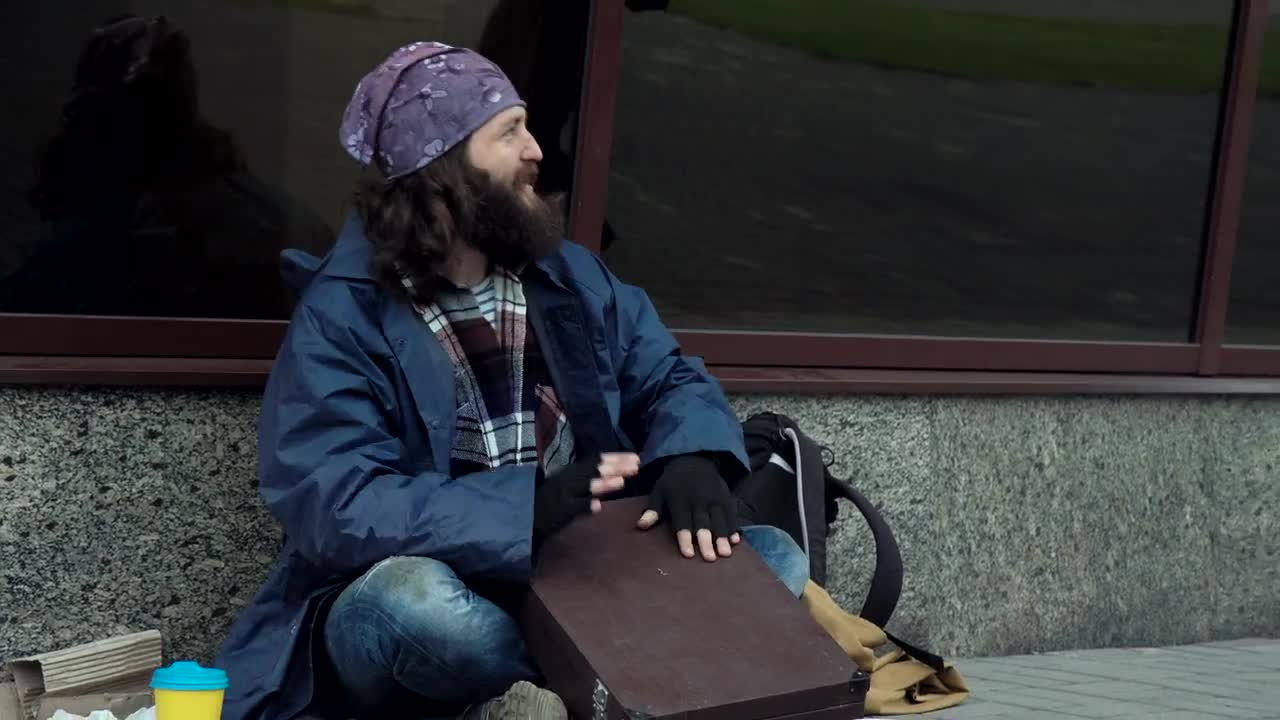 Stock Video Excited Happy Homeless Is Drumming On A Briefcase Live Wallpaper For PC - Free Download