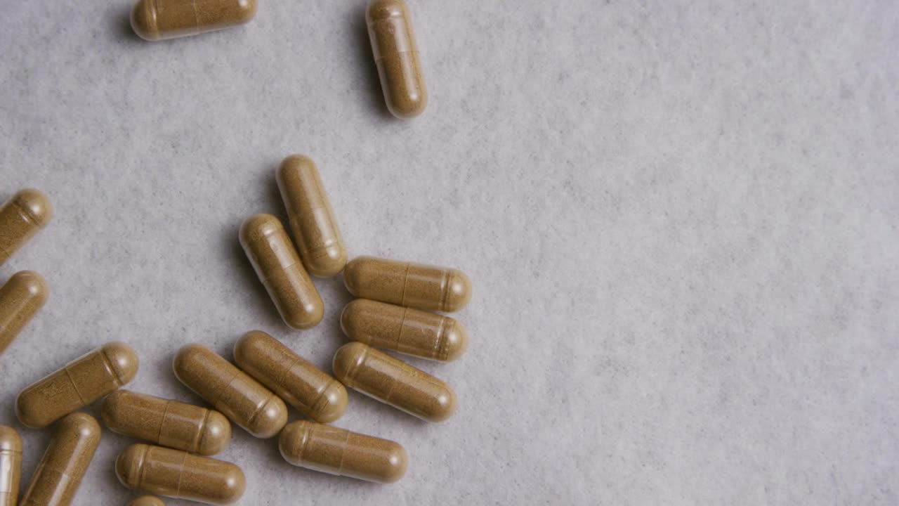 Free Video Stock transparent pills on a white surface Live Wallpaper - Free Download