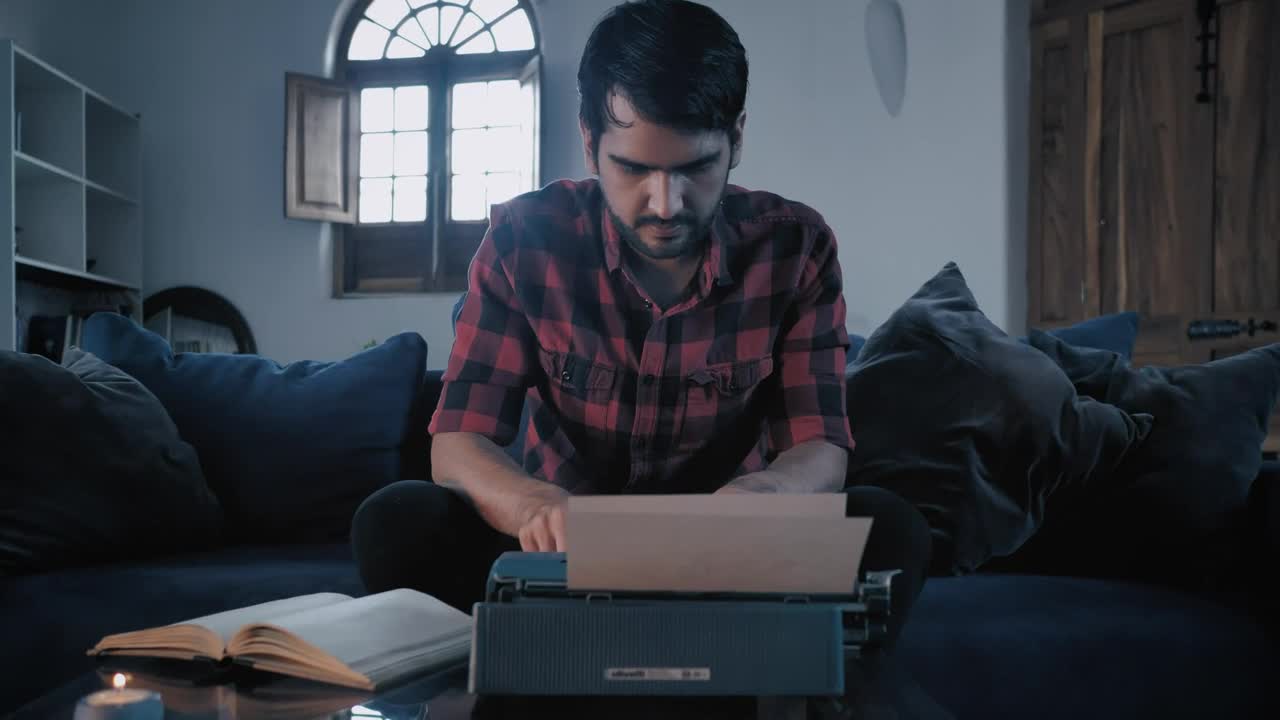 Stock Video Man Typing On A Typewriter Sitting In A Roo Animated Wallpaper - Free Download
