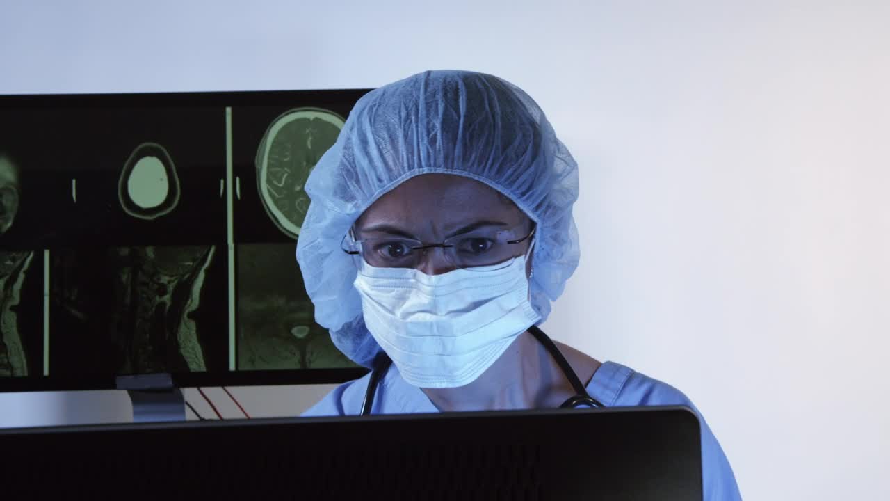 Free Video Stock surgeon reviewing ct scans Live Wallpaper - Free Download