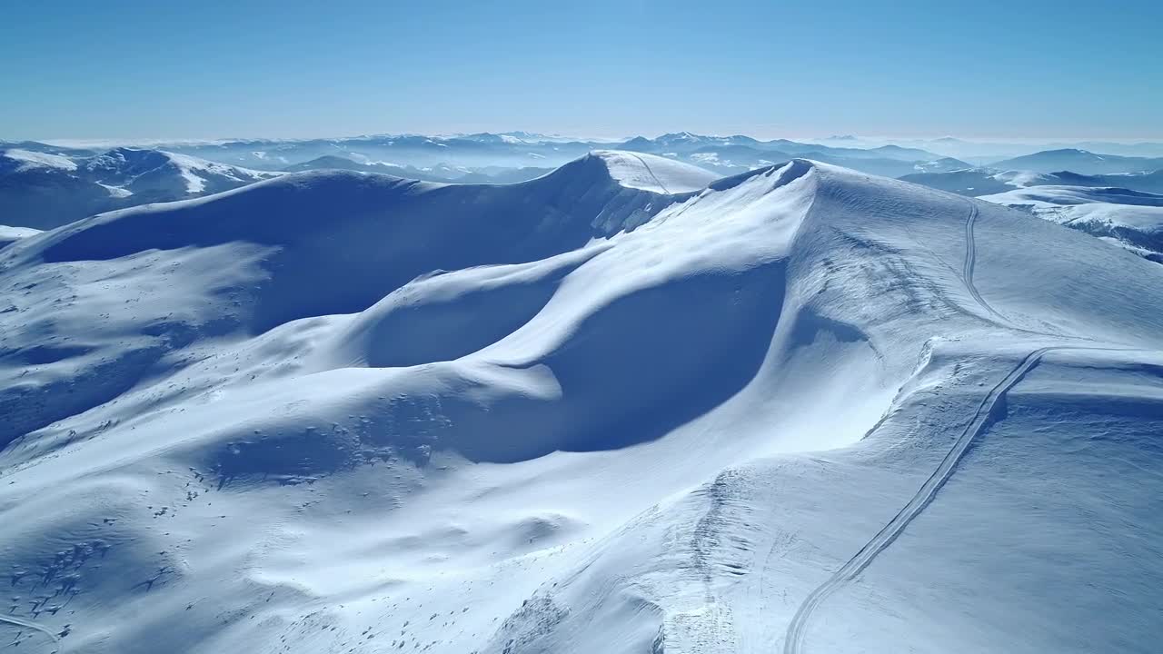 Stock Video Flying Over Turquoise Snowy Mountain Range Live Wallpaper For PC - Free Download