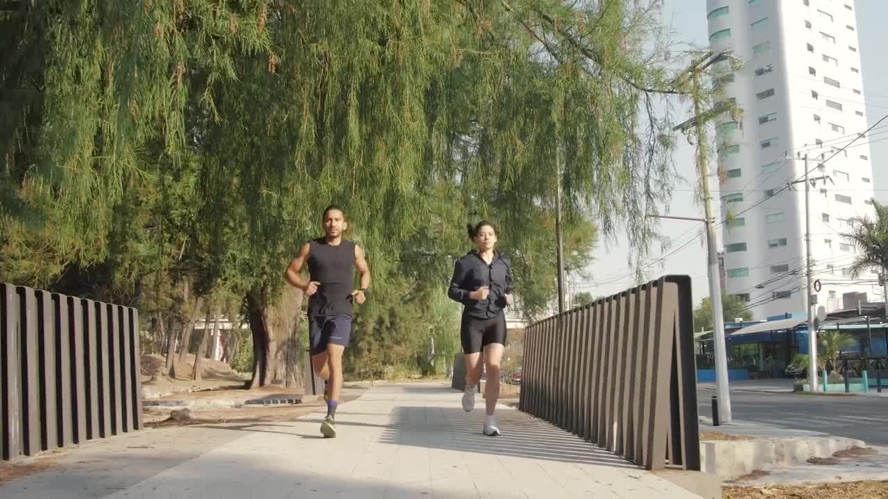 Free Stock Video Young Man And Woman Jogging Outdoors Live Wallpaper - Free Download