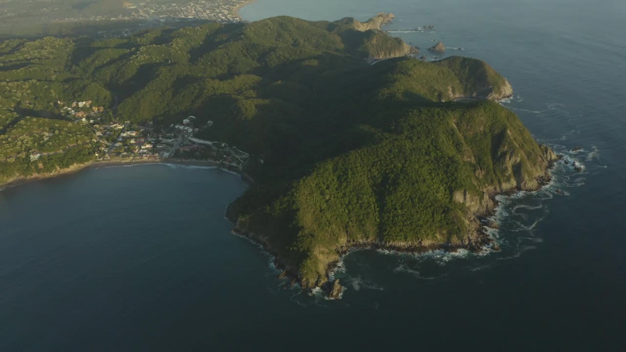 Stock Video Large Island With Mountainous Relief Covered With Trees And Plants Animated Wallpaper - Free Download