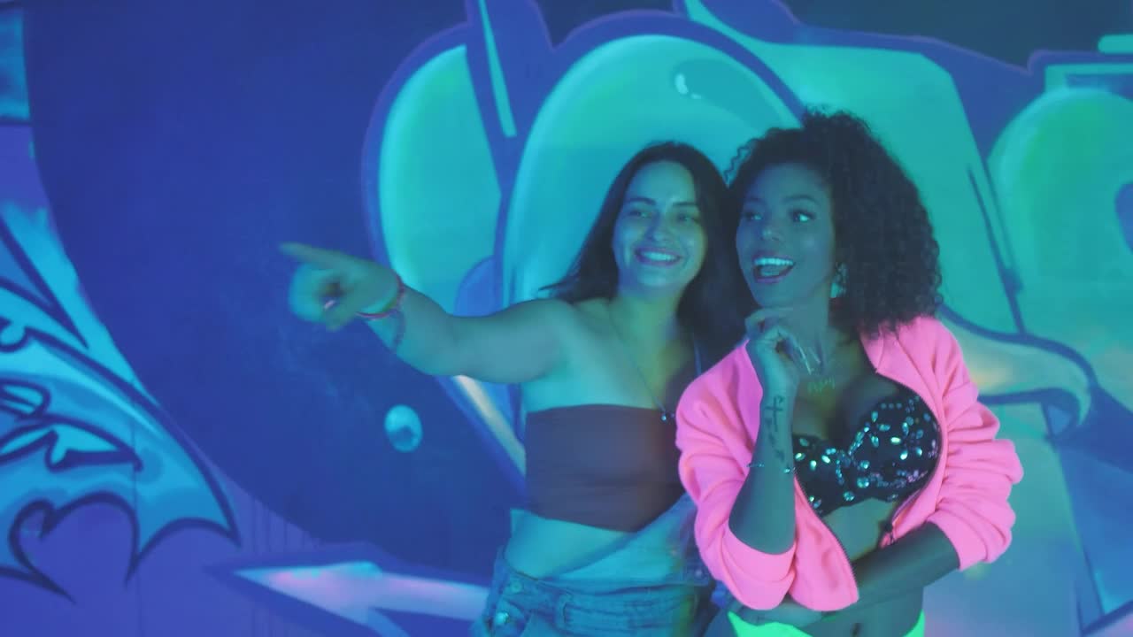 Stock Video Pair Of Girlfriends Laughing Together During A Party Live Wallpaper - Free Download