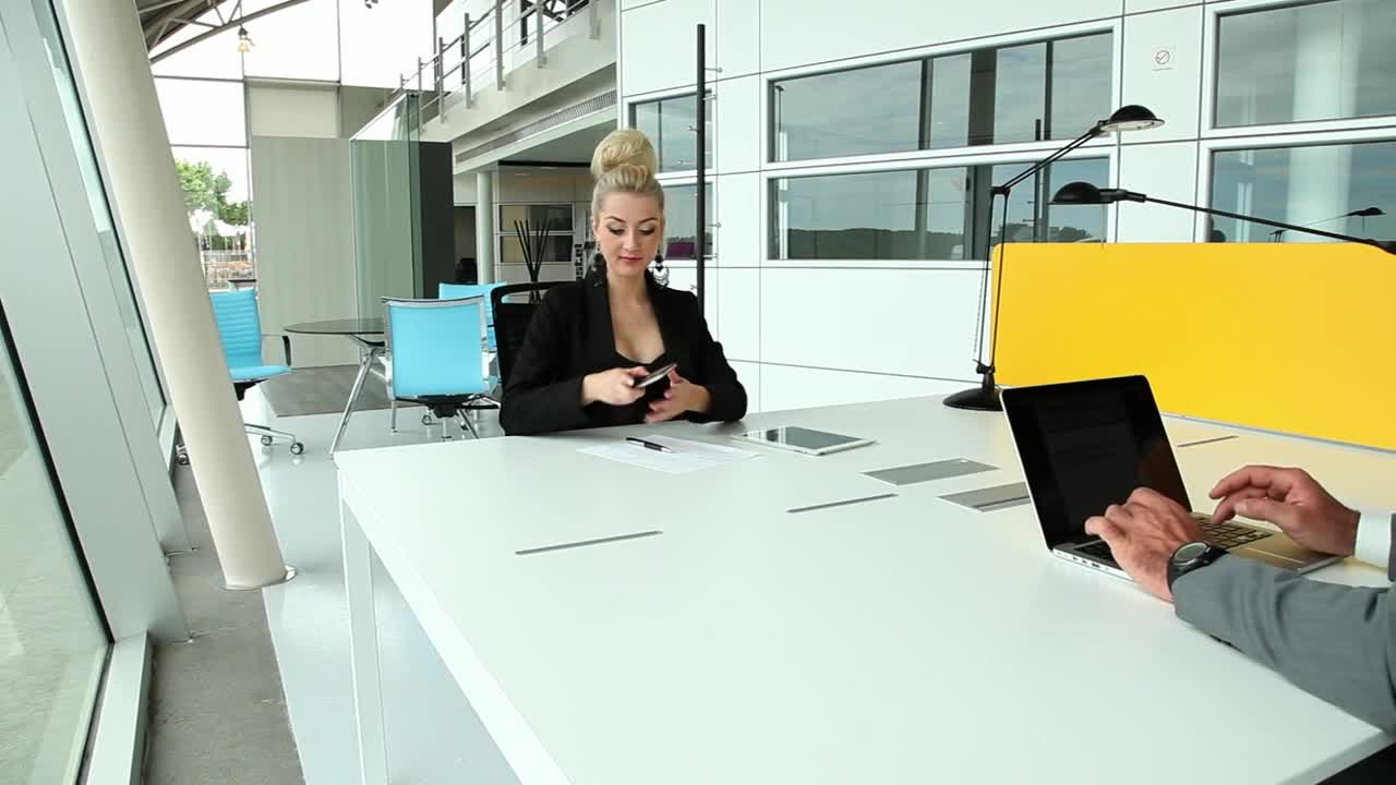 Stock Video Coworkers Sharing Desk At Office Live Wallpaper For PC - Free Download