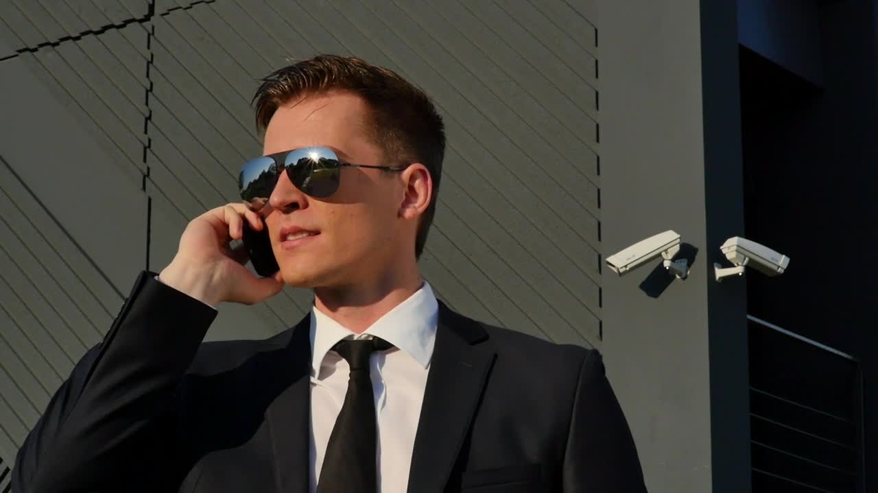 Stock Video Man Smiling On The Phon Animated Wallpaper - Free Download