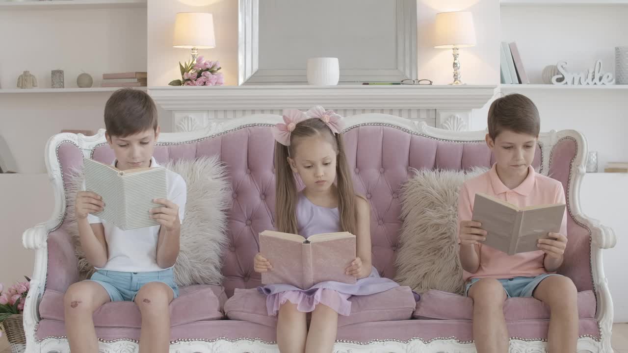Stock Video Little Children Reading Stories In Books Animated Wallpaper - Free Download