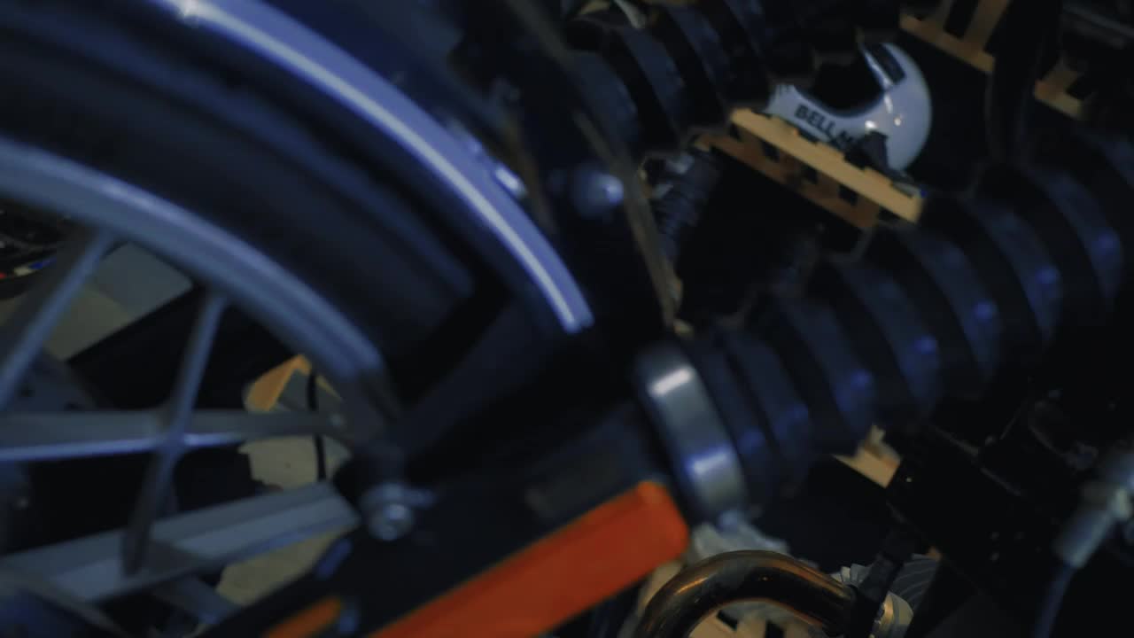 Stock Video Mechanisms Of A Motorcycle In A Worksho Animated Wallpaper - Free Download