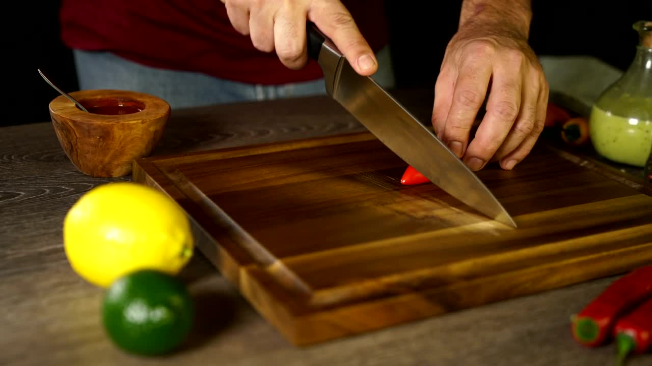 Stock Video Cutting Up A Chilli On A Board Live Wallpaper For PC - Free Download