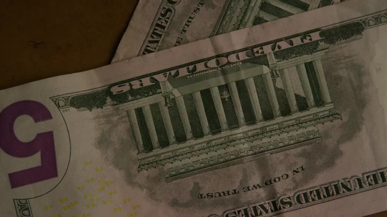 Stock Video Five Dollar Bills Pulling Into The Table Live Wallpaper For PC - Free Download