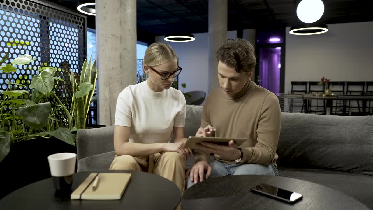 Stock Video Couple Brainstorming With A Tablet Live Wallpaper For PC - Free Download