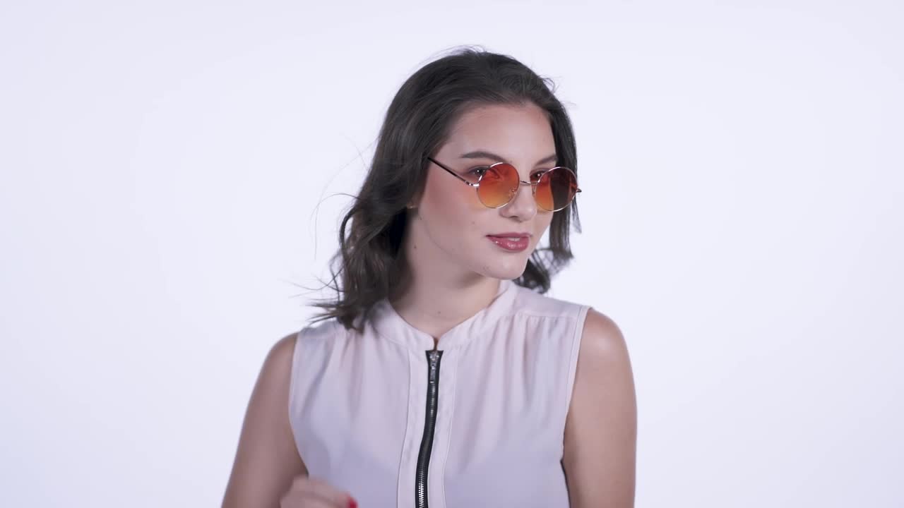 Video Stock Captivating Woman With Glasses On A White Background Live Wallpaper For PC - Free Download
