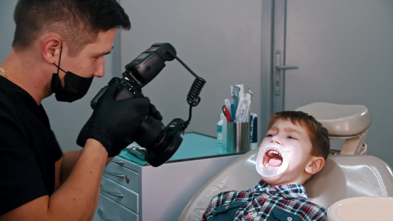 Stock Video Dentist Taking Photos Of A Little Boys Teeth Live Wallpaper For PC - Free Download