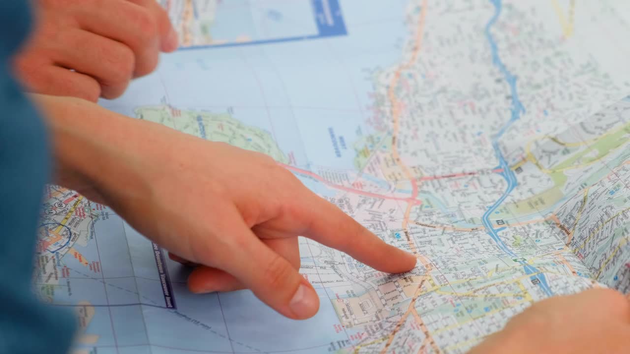 Video Stock Pointing To A Map Of A City With His Hands Live Wallpaper Free - Free Download