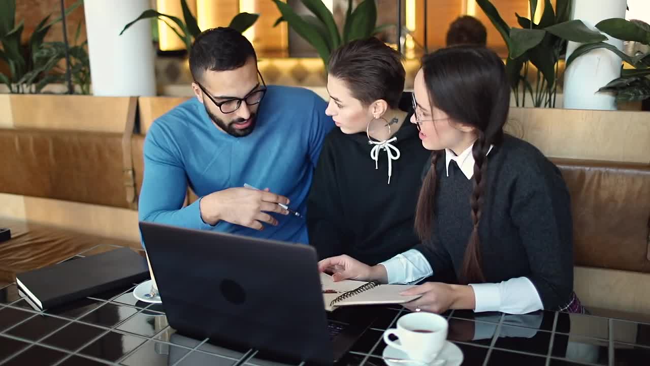 Stock Video Creative Team Researching Project In Cafe Live Wallpaper For PC - Free Download