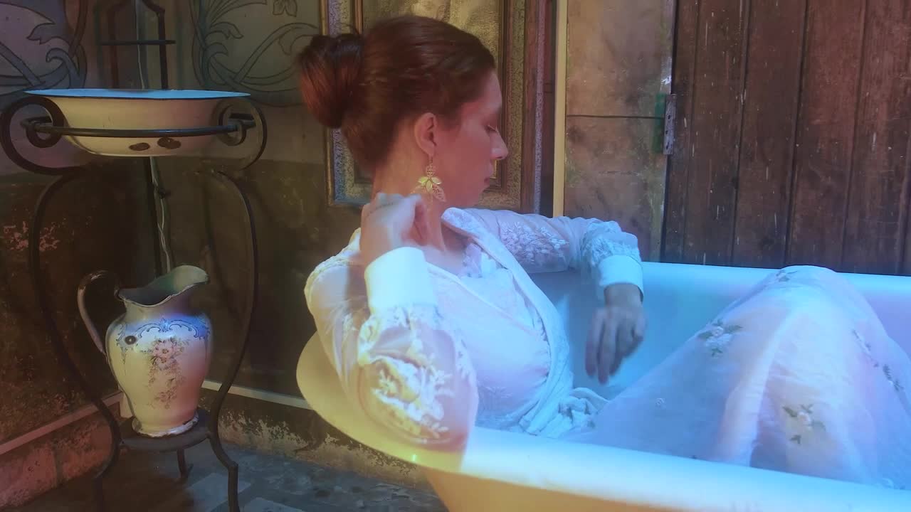 Free Stock Video Woman In A White Dress Models In A Bathtub Live Wallpaper - Free Download