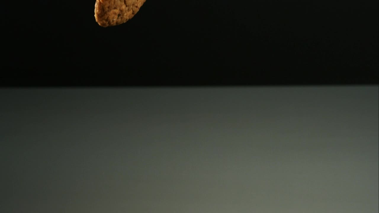 Stock Video Cookies Falling Into A Mirror Surface Live Wallpaper For PC - Free Download