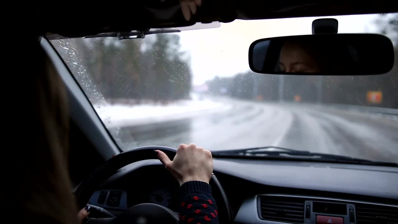 Free Stock Video Woman Driving Down A Lonely Road On A Snowy Day Live Wallpaper - Free Download