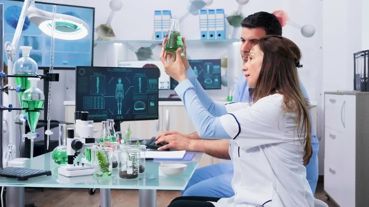 Free Stock Video Researcher Holding A Vial Live Wallpaper - Free Download