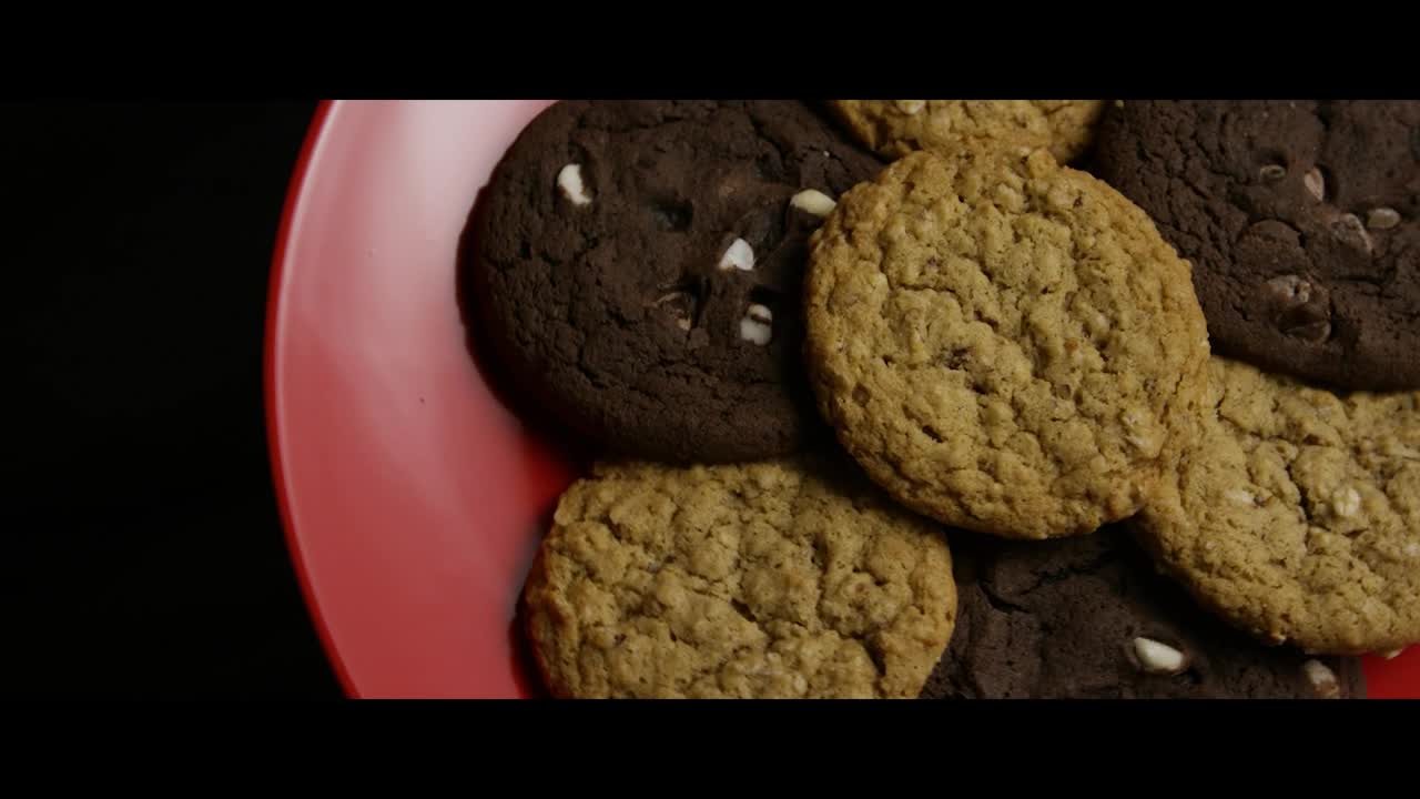 Stock Video Cookies On A Red Plate Rotating Live Wallpaper For PC - Free Download
