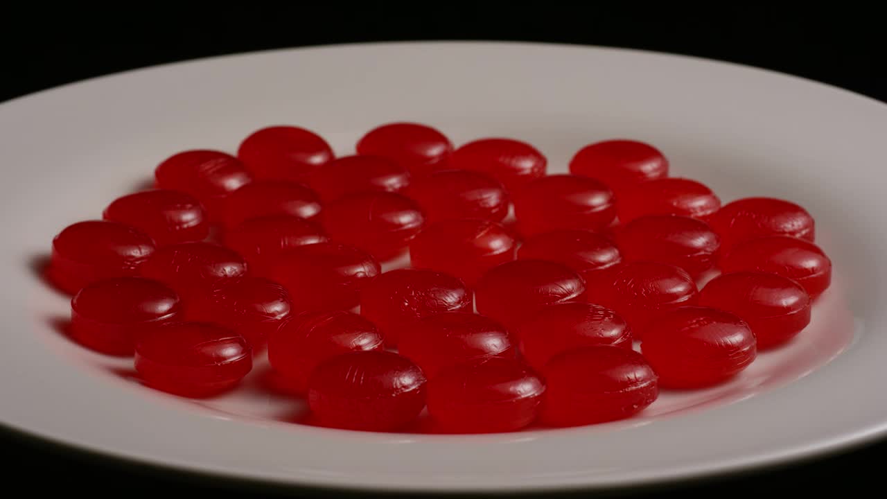 Video Stock Cherry Candies On A Slowly Rotating Plate Live Wallpaper For PC - Free Download